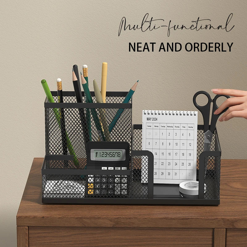 Black mesh desk organizer with pencil holder, calculator, scissors and calendar on wood desk